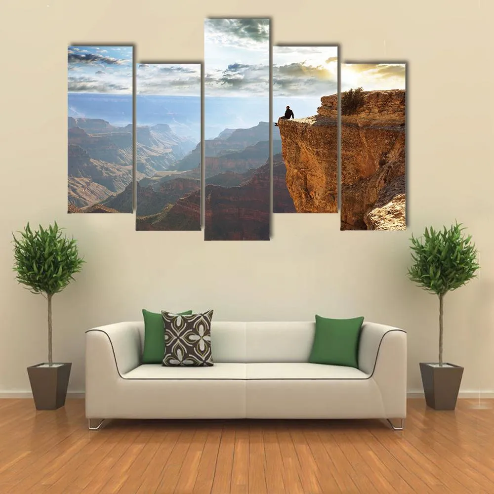 Man Sitting On Grand Canyon Canvas Wall Art