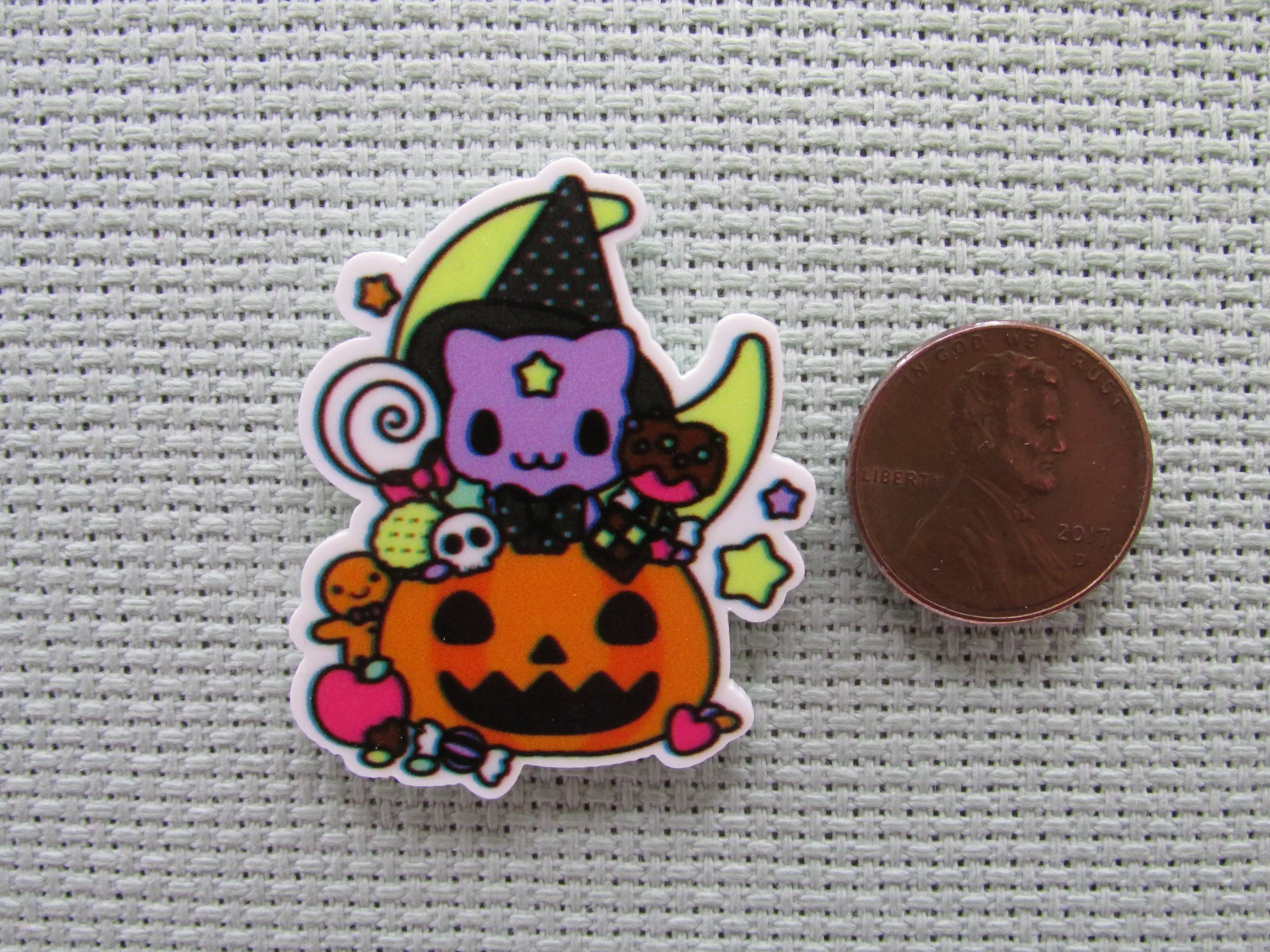 Purple Cat Wearing a Witch's Hat in a Carved Pumpkin full of Candy in Front of a Moon Needle Minder, Cover Minder, Magnet